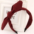 Solid burgundy fabric bunny ear headband with large bow detail for women on white frame - Burgundy