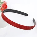 Close-up of glittery red headband with non-slip teeth on a clean white background - Red