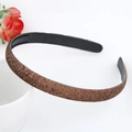 Close-up of glitter frosted headband with non-slip inner teeth for secure hair grip - Coffee