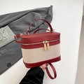 Burgundy leather and canvas rectangle handbag with gold zippers and detachable strap - Red