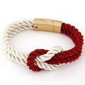 Macro detail of red and white woven cotton cord bracelet with gold magnetic metal clasp - Red and White Style (015062525)