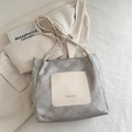 Gray quilted tote bag with woven strap and cream front pocket featuring fashion text - Gray Without Pendant