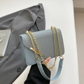 Light blue contrast crossbody bag with chain strap and woven texture detail - Blue