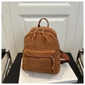 Detail of corduroy texture and dual zippers on a vintage brown large capacity backpack - Brown