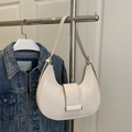 Creamy white leather crescent hobo bag with gold hardware and adjustable strap - White