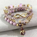 Multi-layer purple bead bracelet set featuring infinity symbol and crown pendant - Purple