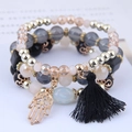 Bohemian multi-layer beaded bracelet set with Hamsa Hand charm and black fringe tassel - Black Hamsa Hand Style