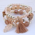 Bohemian multi-layer beaded bracelet with Fatima hand pendant and tassel in warm tones - Coffee Hamsa Hand Style