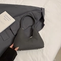 Minimalist dark grey woven hobo bag with silver bottom studs and premium texture - Black