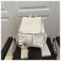 Detail of white textured PU leather backpack with drawstring closure and flap design - White