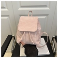 Detail of pink crinkle texture mini backpack with drawstring closure and adjustable straps - Pink