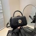 Minimalist black faux leather handbag with gold metal button and detachable strap - Black