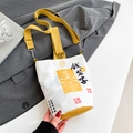 Sac seau en toile blanc et jaune avec calligraphie chinoise et motif de pièces d'or - Blanc