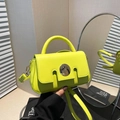 Fluorescent lime green crossbody square bag with top handle and silver buckle detail - Green