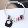 Detalle de pulsera de acero trenzado con cuentas púrpuras y colgante de circonita - Negro (0150805200)
