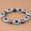 Macro di perline malocchio con cilindri di ematite e distanziatori floreali d'argento - Blu Scuro (015072659)