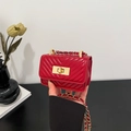 Mini red quilted crossbody bag with gold chain strap and metal turn-lock closure - Red