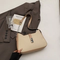Schicke beige Web-Schultertasche mit braunem Lederbesatz und Metalldrehverschluss - Khaki