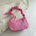 Detailed view of pink shoulder bag with white bow embroidery and ruffled handle detail - Rose Pink