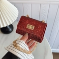 Mini rhinestone crossbody bag in deep red finish with golden chain strap and lock - Red