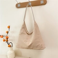 Beige suede hobo shoulder bag featuring gold rivet studs and minimalist design - Beige