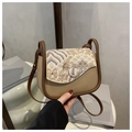 Detail view of the Chinese vintage style embroidery on the beige and brown crossbody bag - Brown