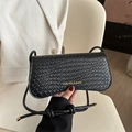 French style black woven underarm bag with gold logo and stylish knotted shoulder strap - Black