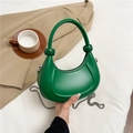 Green leather underarm bag with metal chain strap and top handle in minimalist style - Green