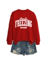 Detail of red sweatshirt with 'literally freezing' print and distressed denim shorts - S / Bright Red (White Print)