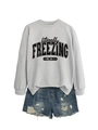 Detail of grey sweatshirt with 'literally FREEZING' text and blue denim shorts set - S / Tops / Grey (Black Print)