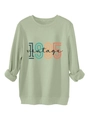 Detail of sage green 1985 vintage sweatshirt showing ribbed hem and printed graphic - Olive Green