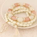 Three-piece bohemian beaded bracelet set with clover charm and fringe tassel detail - White (110102268)
