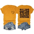 Detail of t-shirt back with text May your coffee be stronger than your daughter's attitude - Mustard Yellow (Black Font)