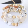 Détails du bracelet bohème multicouche avec coquillages naturels et pendentif fleur - Blanc