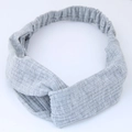 Chic grey ribbed knit headband featuring a twist knot design and elastic back strap - Gray