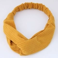 Ginger yellow knitted twist headband with ribbed texture and elastic band for women - Yellow