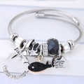 Zilveren bedelarmband met zwarte walvis hanger, vlinder kralen en kristallen accenten - Zwart