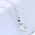 Macro view of silver necklace featuring a cube pendant set with sparkling cubic zirconia - Silver Cube Style (_018120512)