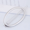 Minimalist silver oval metal hair clip with a polished finish for modern styling - Minimalist Oval Style (110414240)