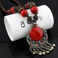 Ethnic bohemian long necklace with red beads and vintage metal bell pendants - Red Necklace