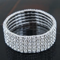 Elegant 5-row crystal rhinestone stretch bracelet with silver base on a mirror surface - 5-Row Style (09052705)