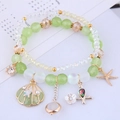 Zweiteiliges Perlenarmband im Meeresdesign mit Seestern-Anhängern in Mintgrün und Weiß - Grün