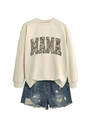 Flat lay of cream crewneck sweatshirt with MAMA camo print and ripped denim shorts - S / Sand