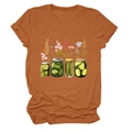 Détail d'un t-shirt orange rouille avec motif graphique de bocaux de cornichons et fleurs - S / Orange Brûlé