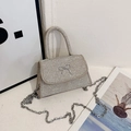 Elegant silver glitter square bag with metallic bow and chain strap in variant finish - Gold