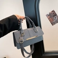 Gray-blue textured fabric crossbody bag with gold metal trim and adjustable strap - Black