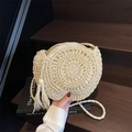 Handmade beige round straw shoulder bag with long tassels and woven strap for beach vacation - Off White