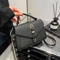 Black pebbled leather square handbag with gold buckle and adjustable strap - Black