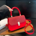 Elegant red leather crossbody bag with glitter flap and gold handle for formal events - Red