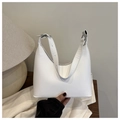 Detailed side view of white leather shoulder bag with adjustable silver metal buckle - White